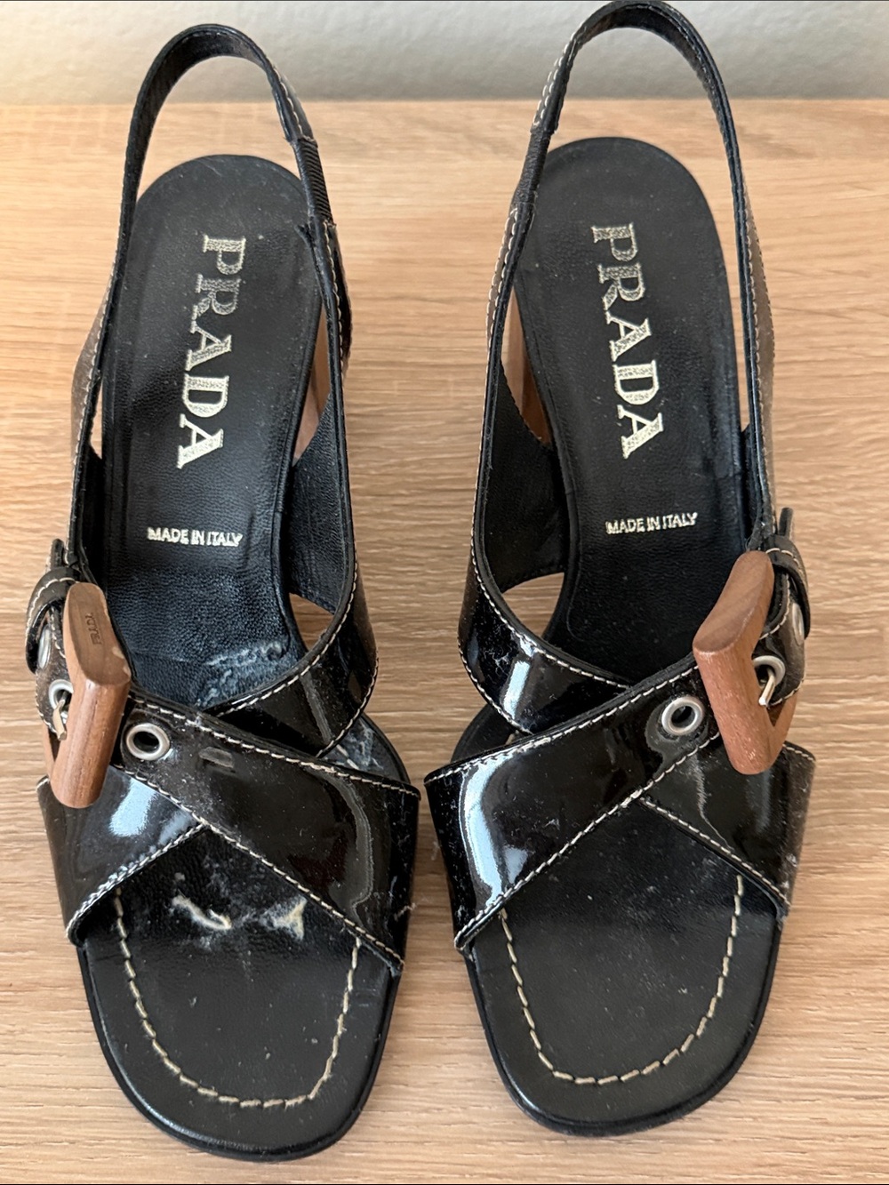 Prada Black Patent Leather Cross-Strap Slingback Heels with Wood Buckles